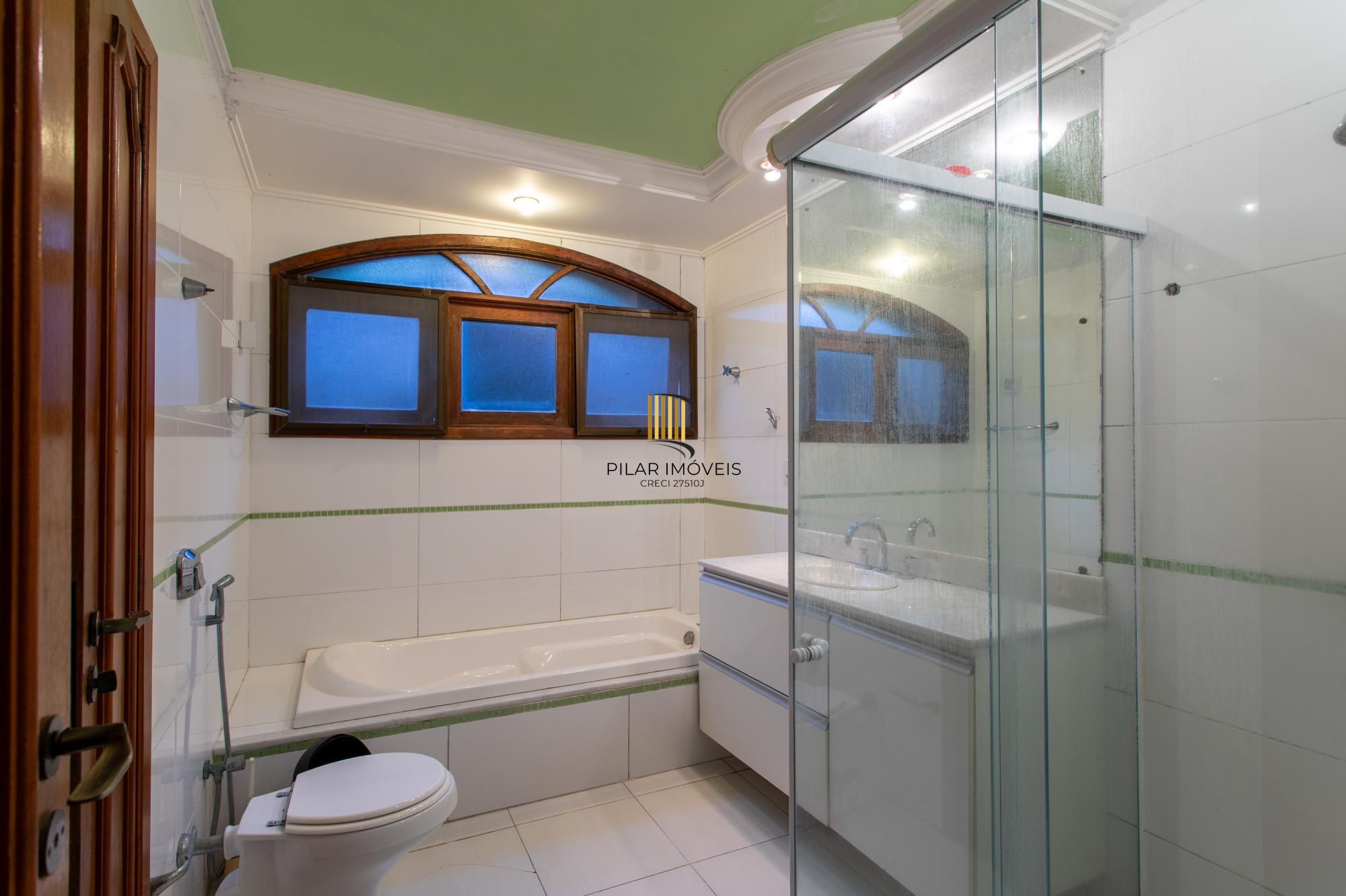 Casa em Condomínio à venda com 5 dormitórios, 565m² e 4 vagas no Condominio Jardim do Sol, Zona Sul de Porto Alegre