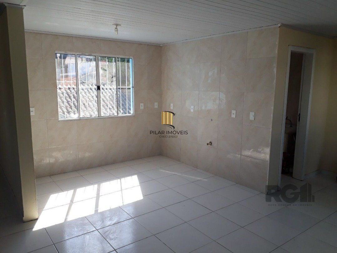 Oportunidade Imperdível: Prédio com 4 Apartamentos, Pátio e 2 Vagas de Garagem