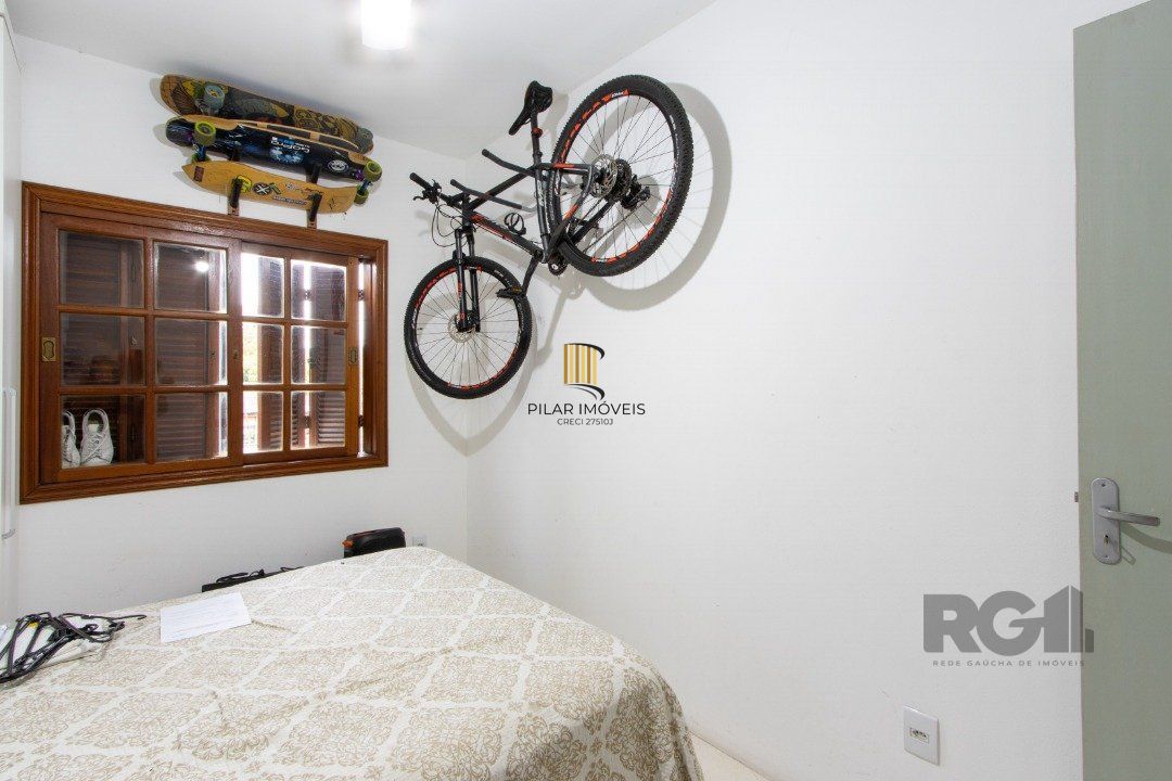 Casa de Condomínio 3 dormitórios no bairro Camaquã