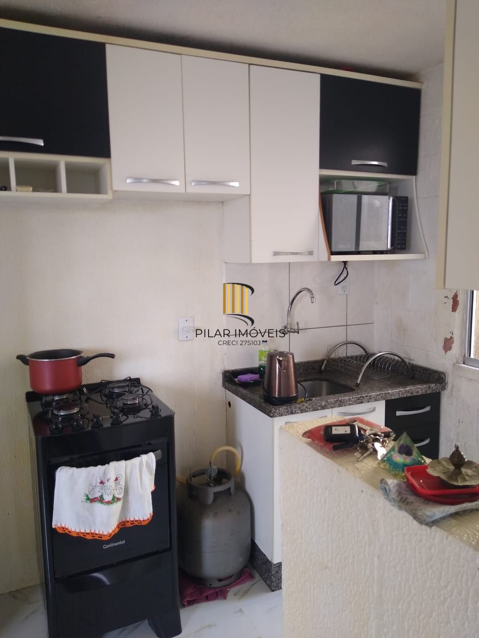 APARTAMENTO 2 DORMITÓRIOS E 1 VAGA DE GARAGEM PRONTO PARA MORAR NO BAIRRO VILA NOVA