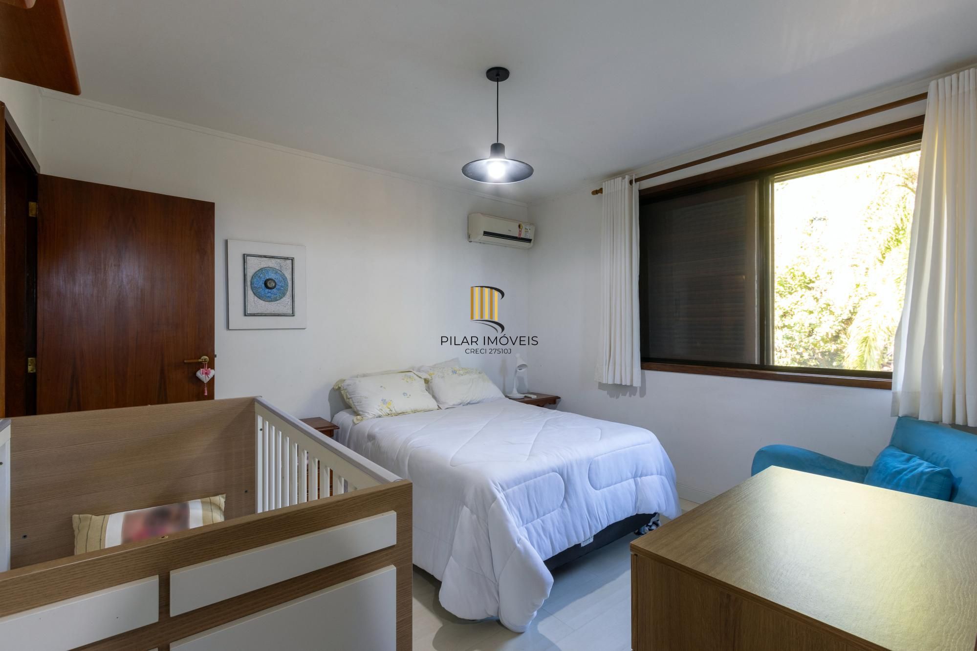 Casa de Condomínio 4 dormitórios no bairro Cavalhada