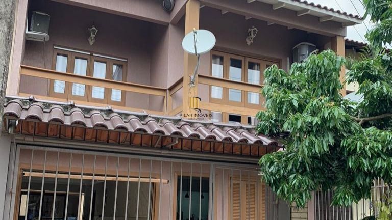 Casa 5 dormitórios no bairro Jardim Algarve - Pilar Imóveis