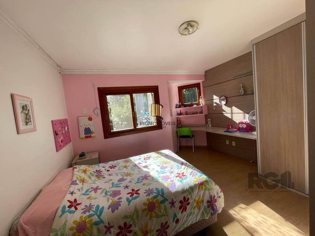 Casa de Condomínio 4 dormitórios no bairro Cavalhada