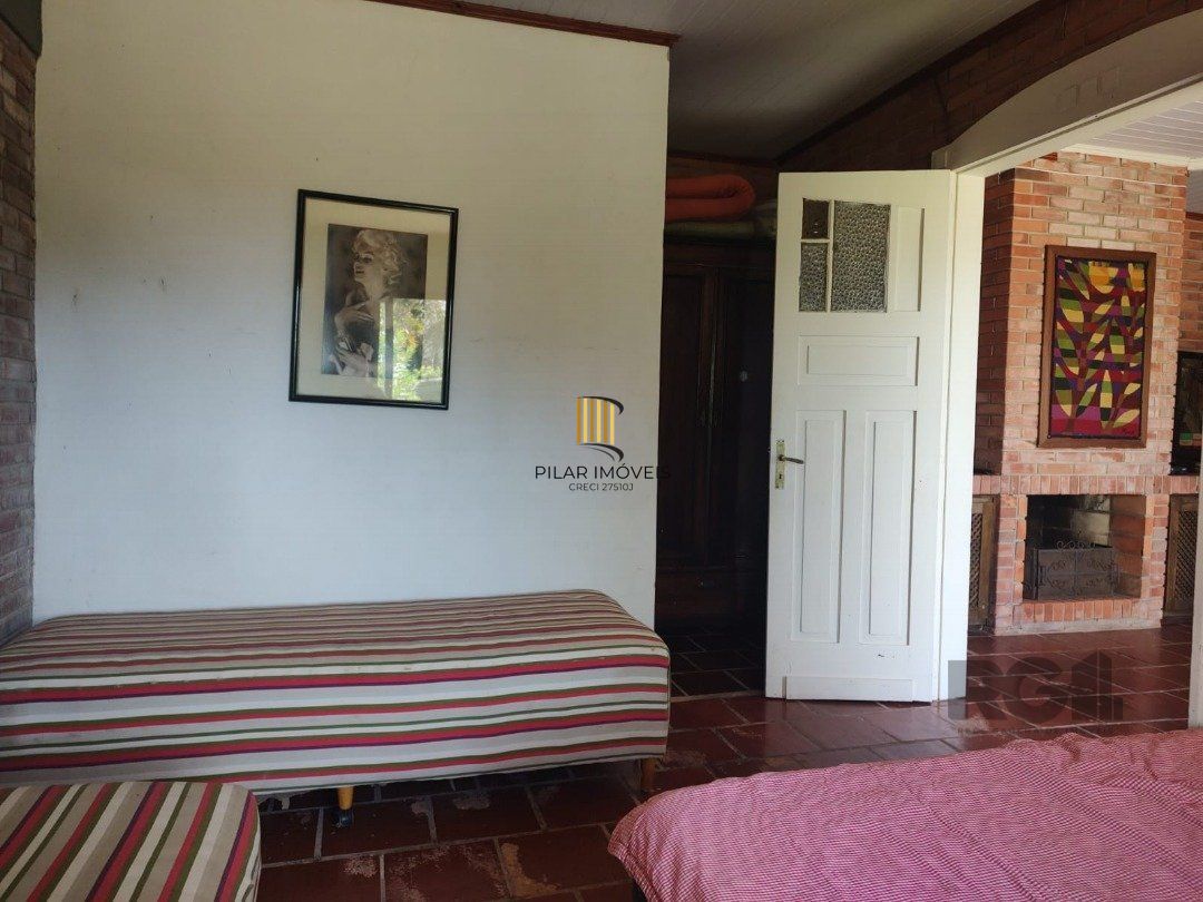 Casa 5 dormitórios no bairro Atlântida