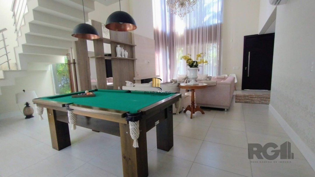 Casa de Condomínio 4 dormitórios no bairro Atlântida Sul