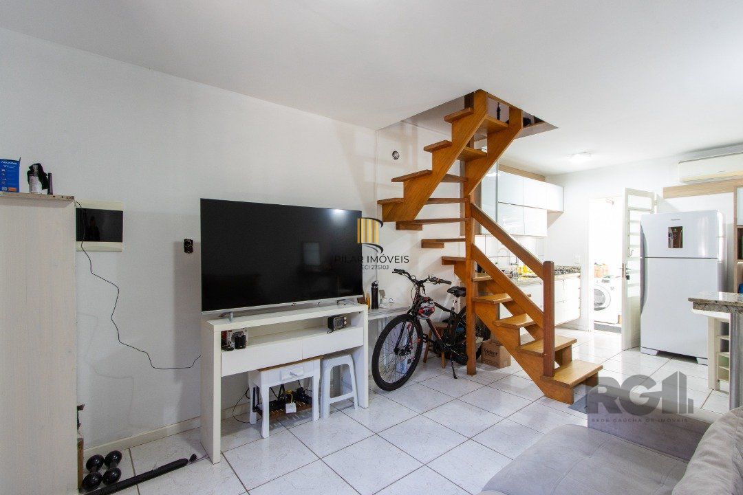 Casa de Condomínio 3 dormitórios no bairro Camaquã