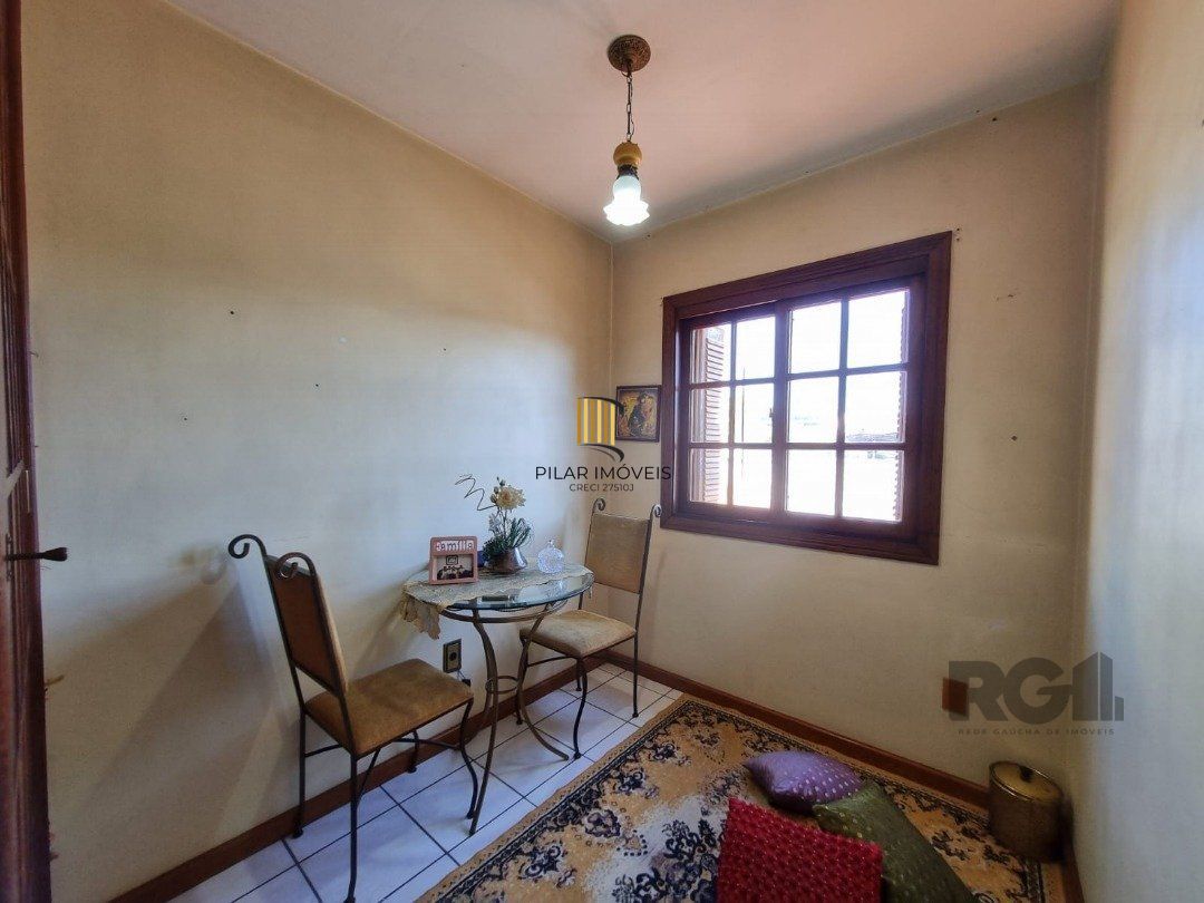 Casa de Condomínio 3 dormitórios no bairro Camaquã