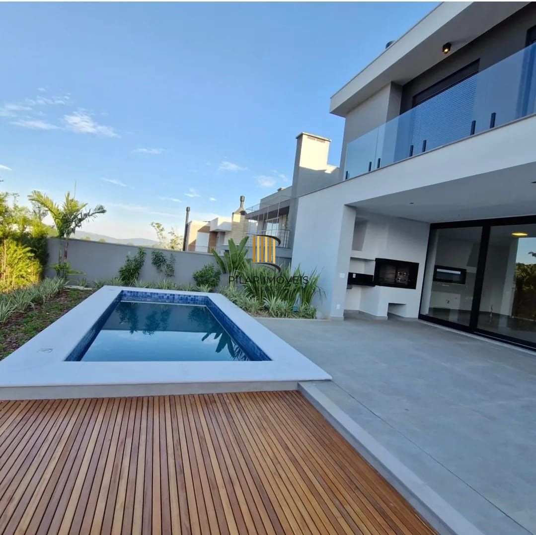 Casa de Condomínio 4 dormitórios no bairro Vila Nova