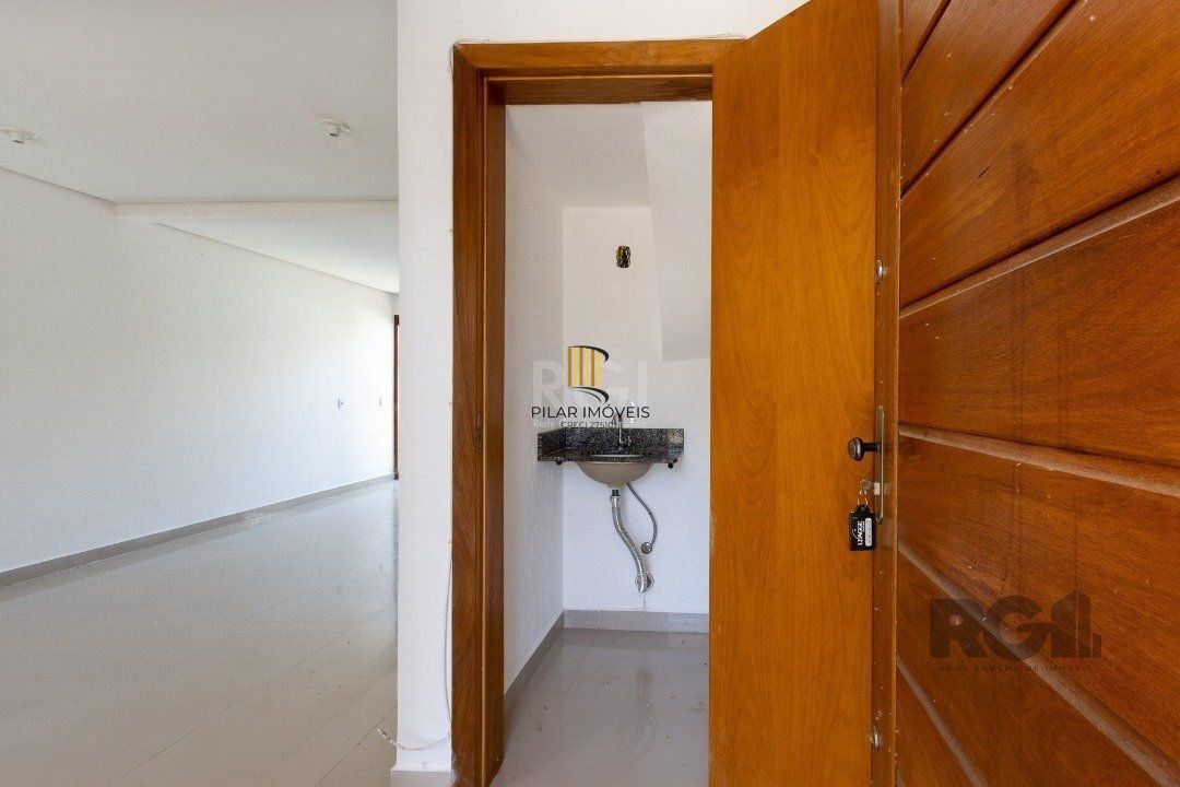 Casa 3 dormitórios no bairro Guarujá