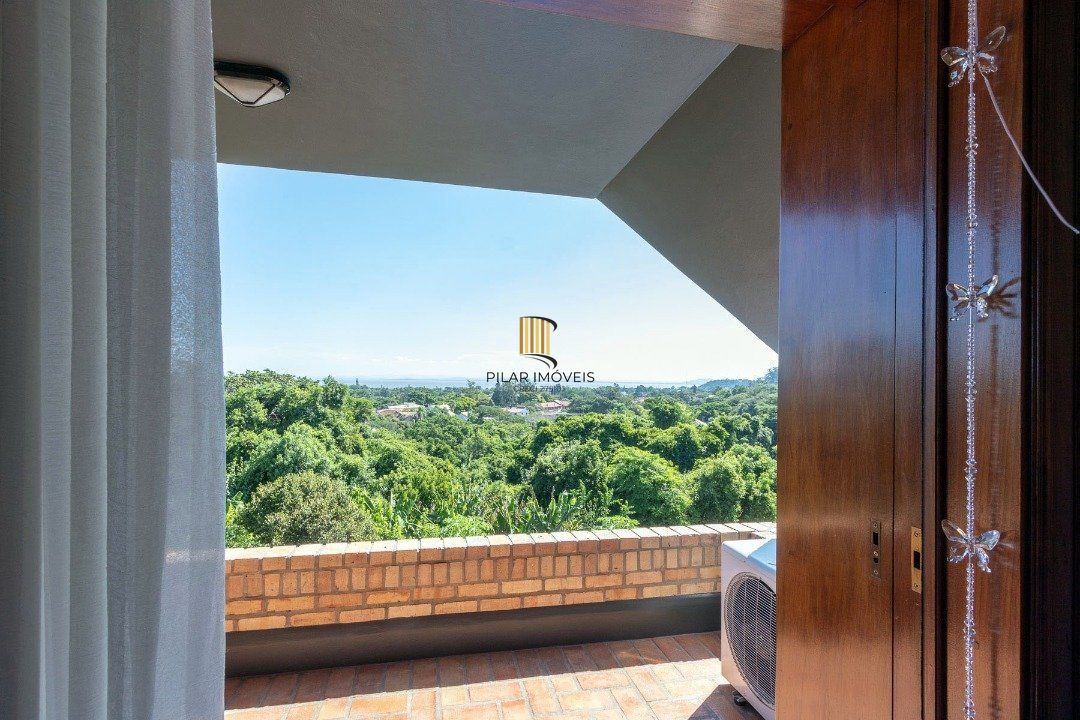 Casa Condominio para Venda - 559m², 4 dormitórios, sendo 3 suites, 3 vagas - Cavalhada