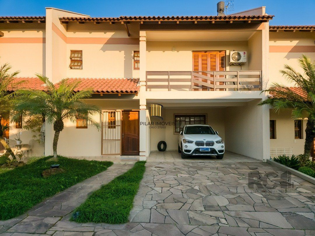 Casa de Condomínio 3 dormitórios no bairro Cavalhada