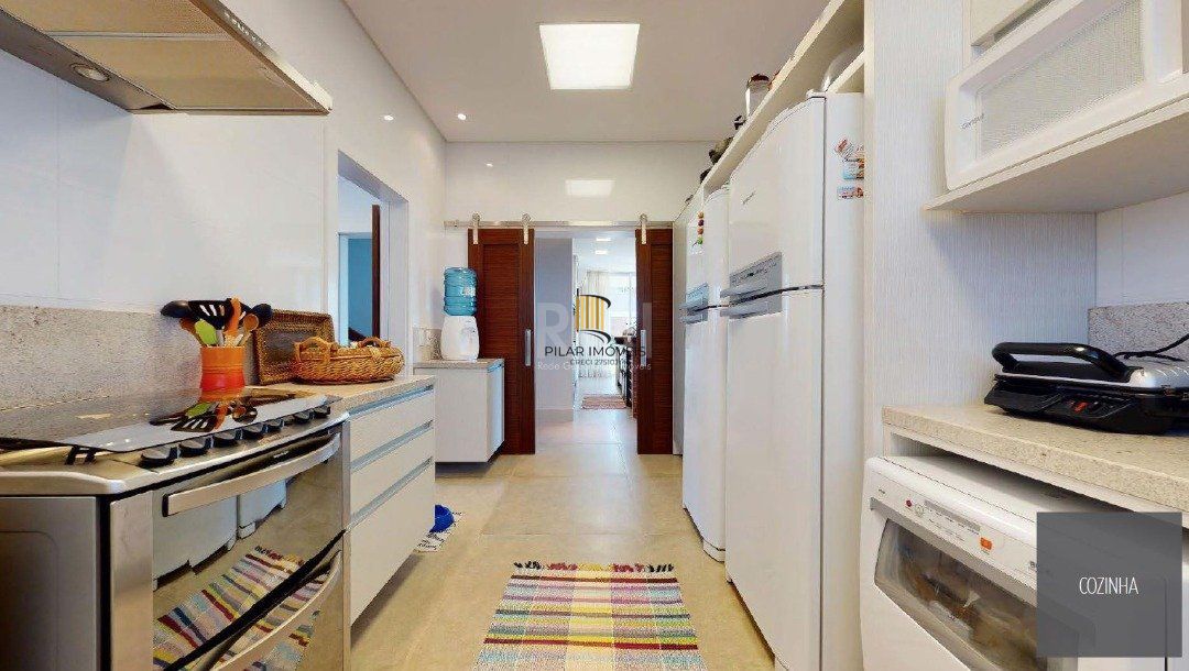 Casa de Condomínio 4 dormitórios no bairro Atlântida