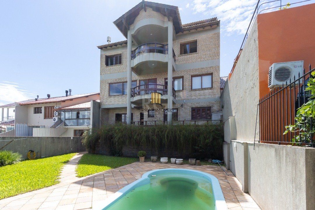 Casa de Condomínio 4 dormitórios no bairro Nonoai