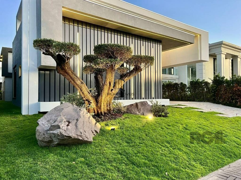 Casa térrea no Condomínio Velas da Marina com 4 suítes, piscina e 243m² privativos