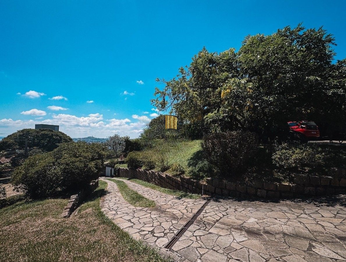 Casa bairro Sétimo Céu, 463m² privativos, vista privilegiada do Rio Guaíba em terreno de 1.423m².