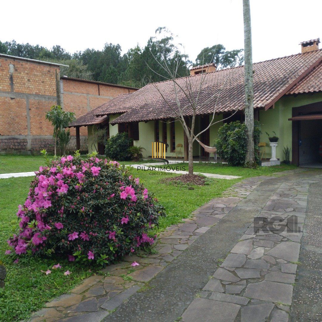 Casa 4 dormitórios no bairro Restinga - Pilar Imóveis