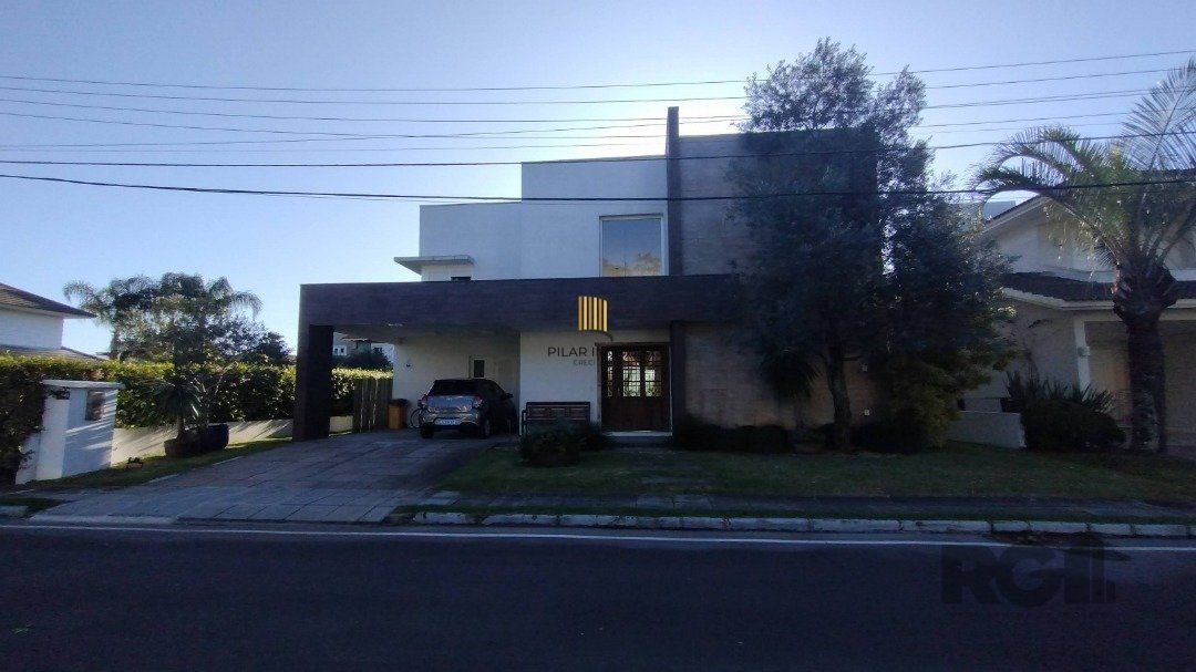 Casa de Condomínio 5 dormitórios no bairro Atlântida - Pilar Imóveis