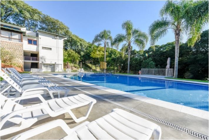 Casa em Condomínio à venda com 5 dormitórios, 565m² e 4 vagas no Condominio Jardim do Sol, Zona Sul de Porto Alegre