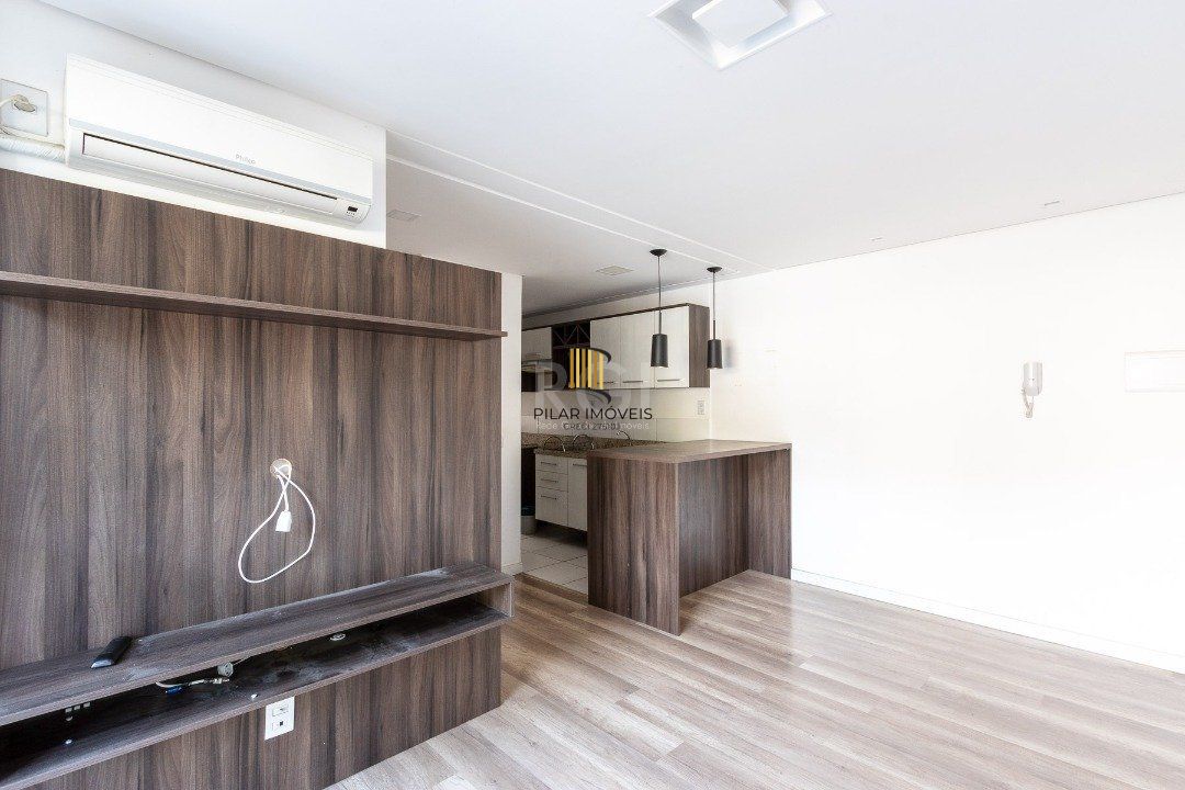 Apartamento 2 dormitórios , sala com dois ambientes , cozinha americana sacada com churrasqueira 1 vaga
