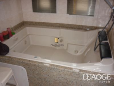 casa com 4 dormitórios, sendo uma suíte , e 530 area privativa - Pilar Imóveis