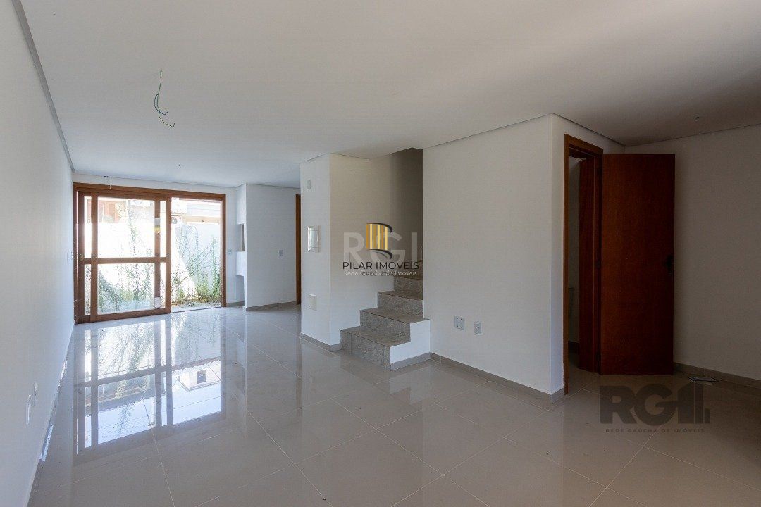 Casa 3 dormitórios no bairro Guarujá