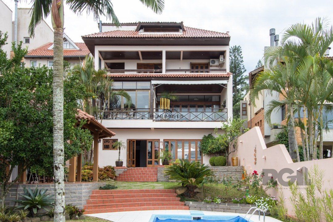 Casa para Venda com 4 dormitórios, sendo 2 suites e 4 vagas no bairro Jardim Isabel
