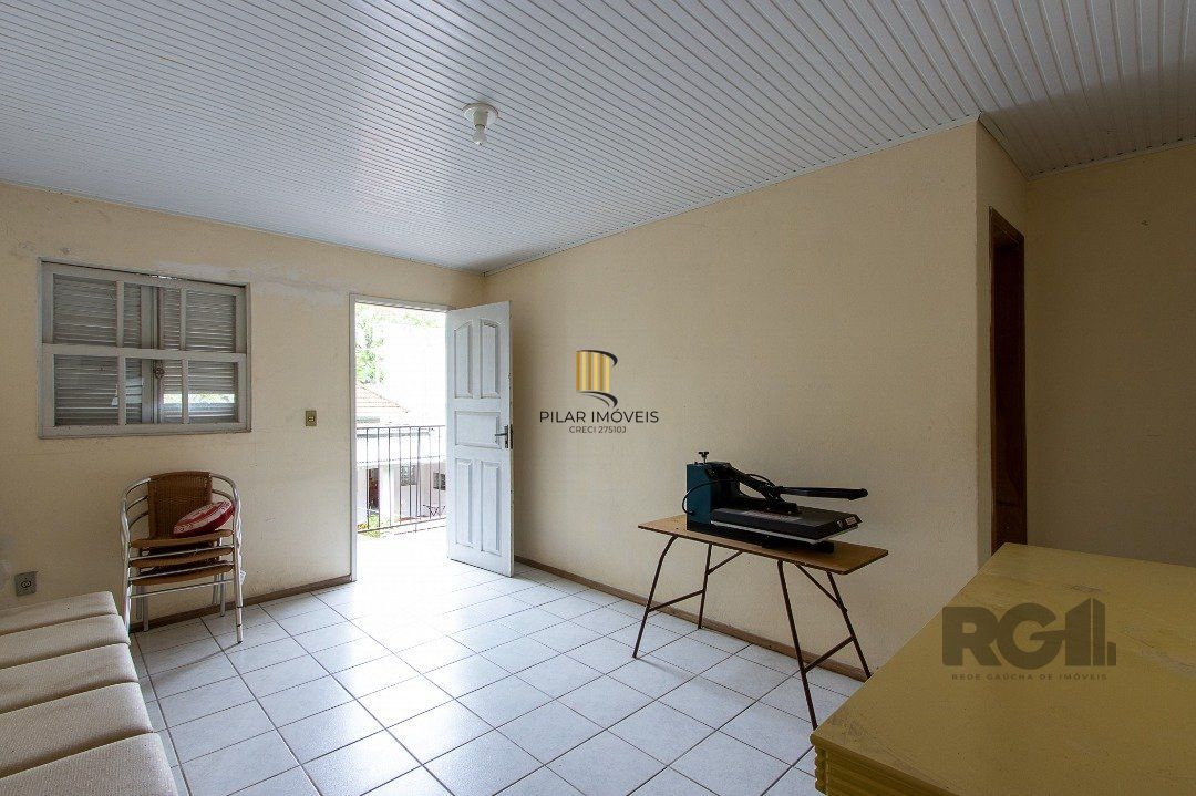 Casa 5 dormitórios no bairro Ipanema