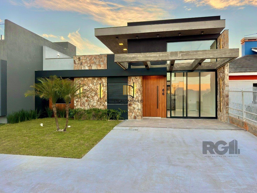 Casa 3 dormitórios no bairro Zona Nova - Pilar Imóveis