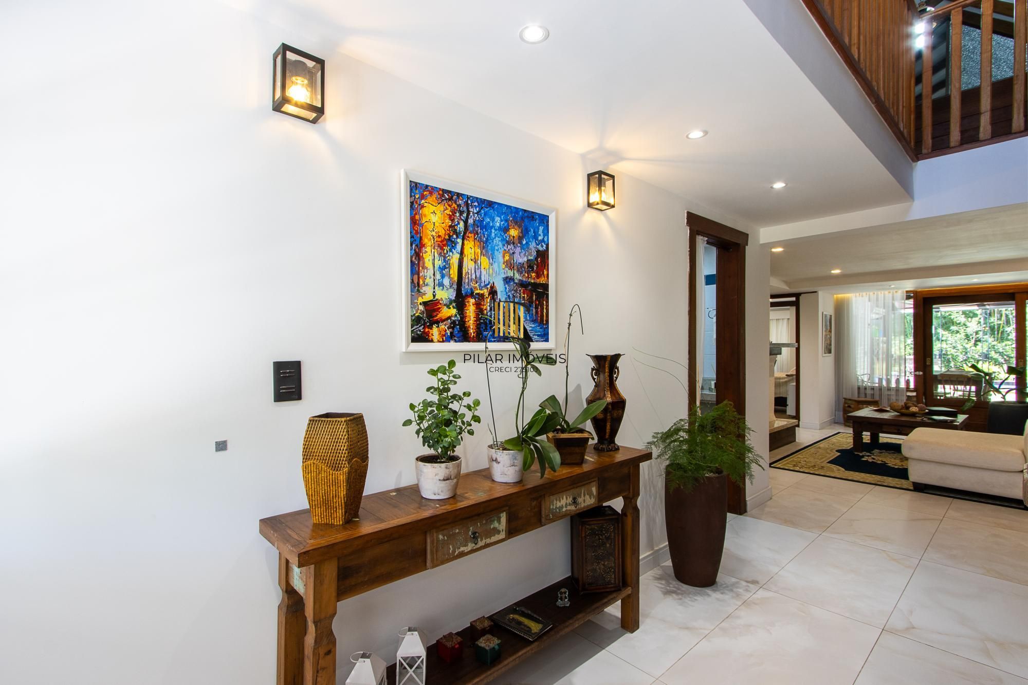 Casa 4 suites no Terra Ville, com home office, estar íntimo, 4 vagas e piscina.