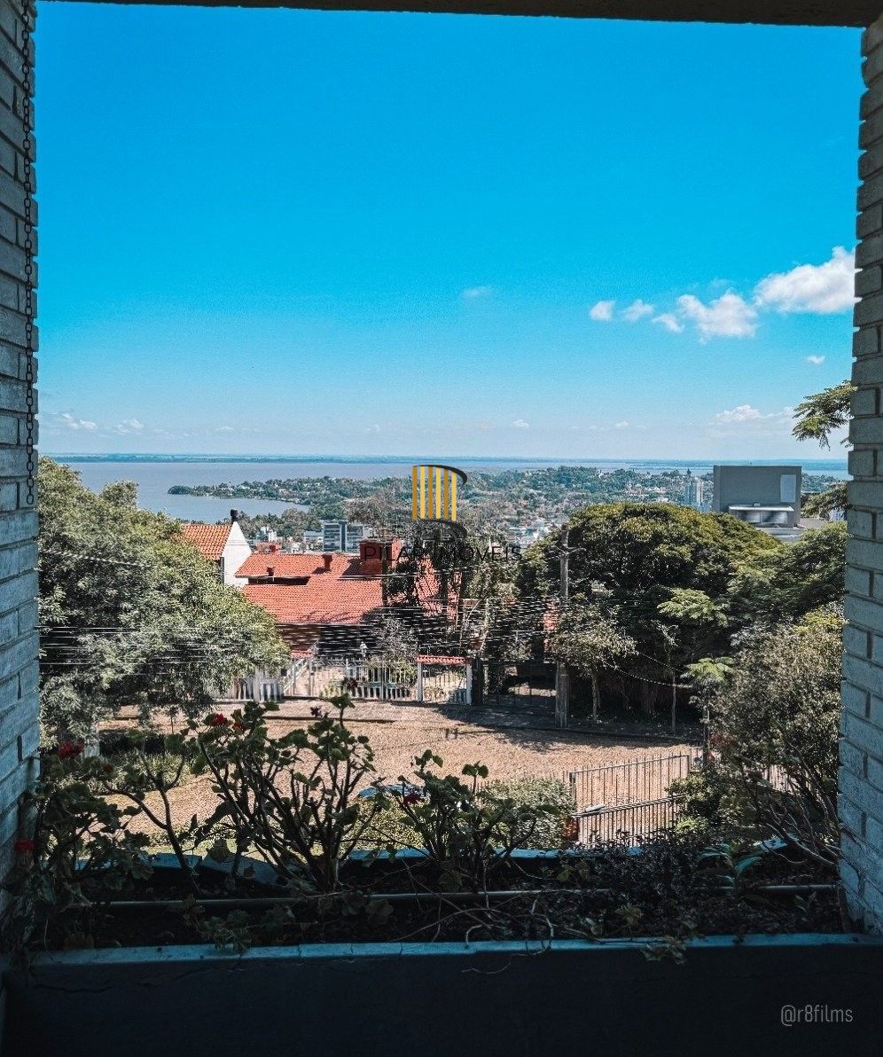 Casa bairro Sétimo Céu, 463m² privativos, vista privilegiada do Rio Guaíba em terreno de 1.423m².