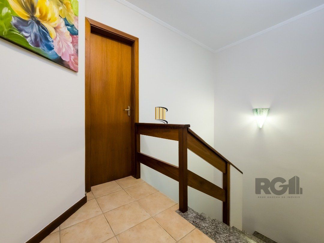Casa de Condomínio 3 dormitórios no bairro Cavalhada