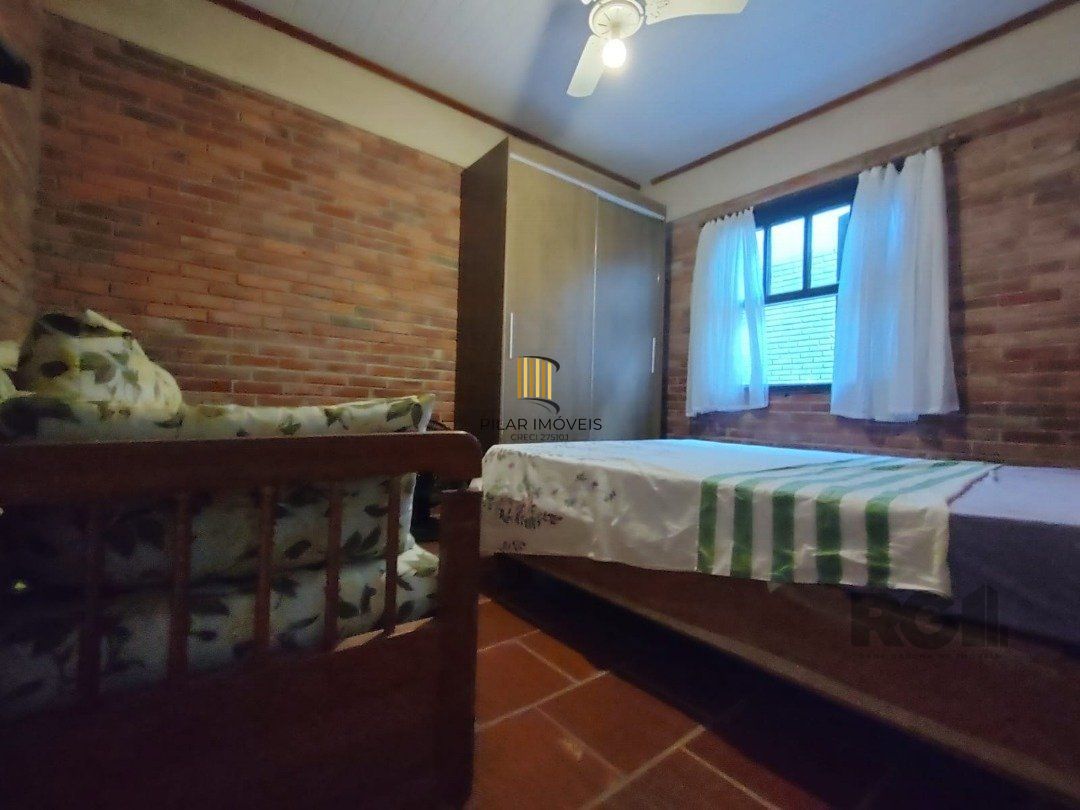 Casa 5 dormitórios no bairro Atlântida