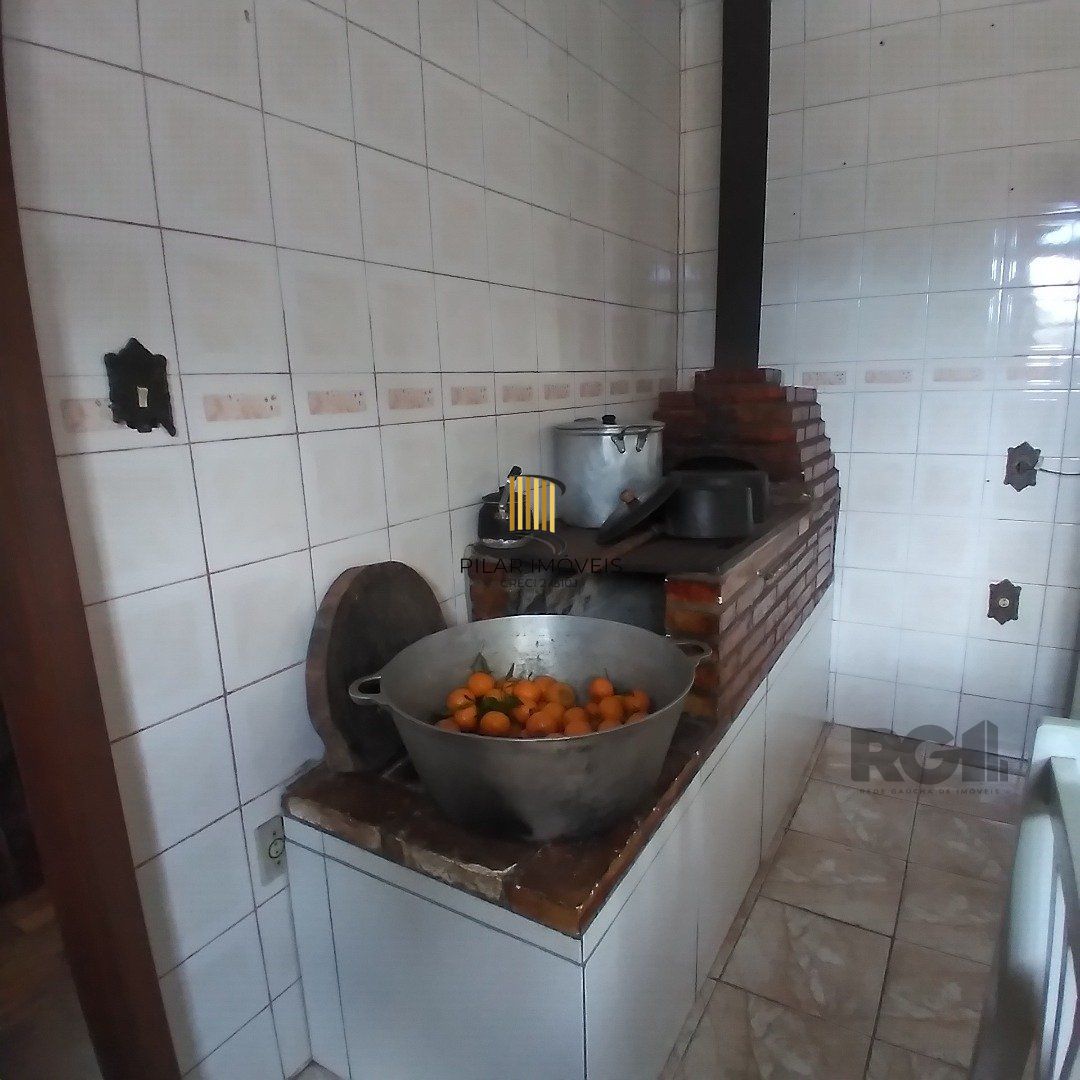 Casa 4 dormitórios no bairro Restinga
