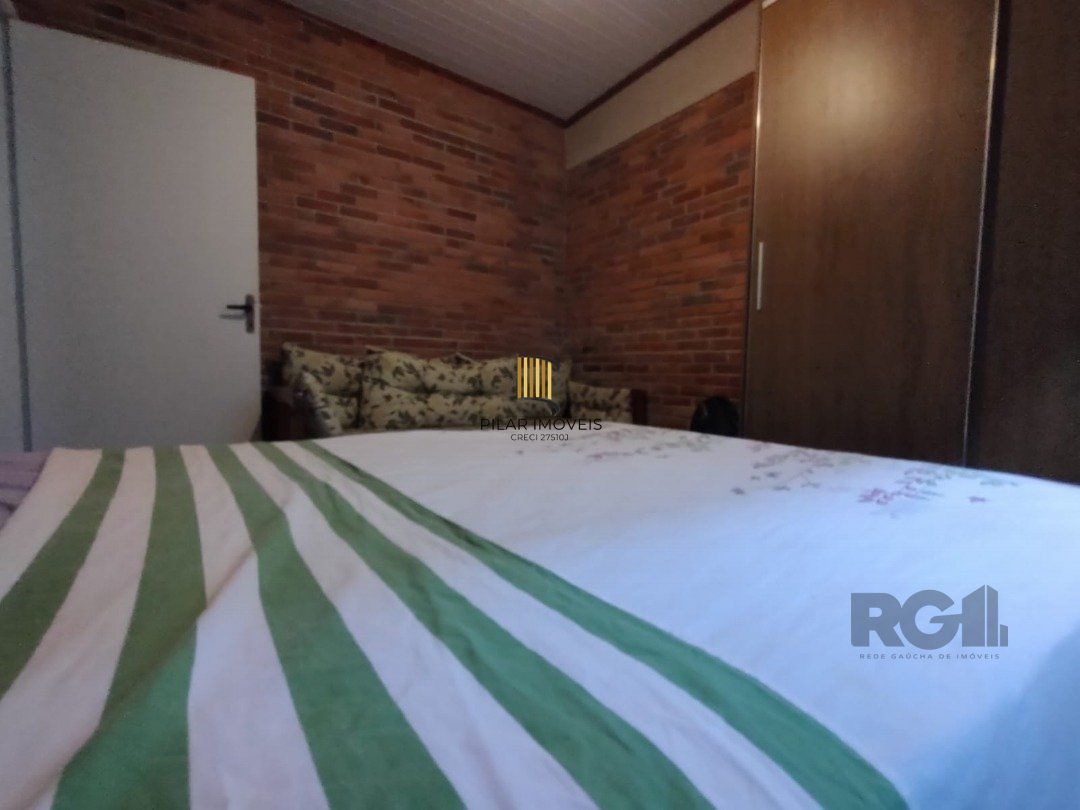 Casa 5 dormitórios no bairro Atlântida
