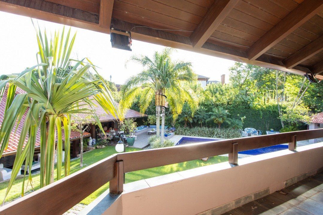 Casa de Condomínio 8 dormitórios no bairro Cavalhada