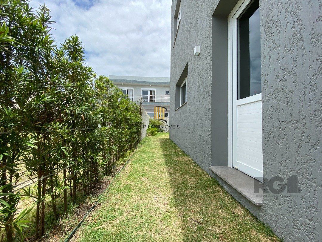 Casa de Condomínio 4 dormitórios no bairro Atlântida Sul