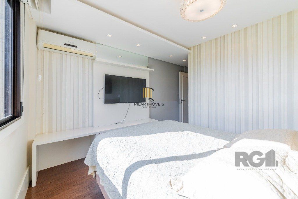 Vende-se excelente apartamento 2 quartos c/ 2 suítes, 2 vagas, living com lareira, sacada e churrasqueira - 98m² - Auxiliadora