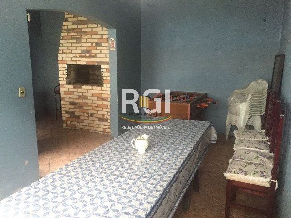 Casa à Venda – 320m², 3 Dormitórios (1 Suíte), 5 Vagas – Partenon