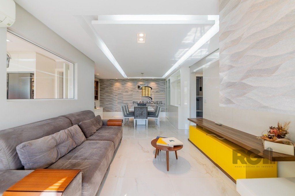 Vende-se excelente apartamento 2 quartos c/ 2 suítes, 2 vagas, living com lareira, sacada e churrasqueira - 98m² - Auxiliadora