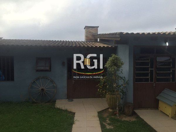Casa à Venda – 320m², 3 Dormitórios (1 Suíte), 5 Vagas – Partenon