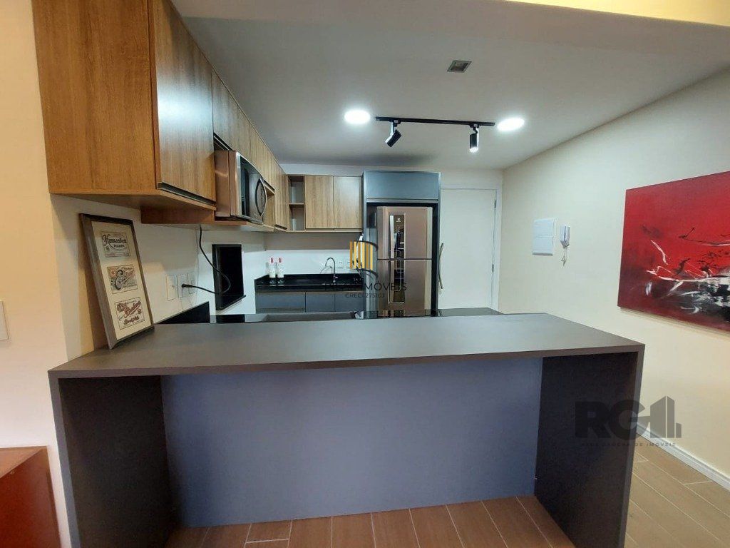 Apartamento stidio com 1 dormitório, 1 vaga de garagem no Bairro Auxiliadora.