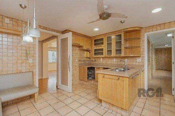 Vende-se luxuoso apartamento 3 quartos c/ suíte, dependência de empregada, gabinete, 2 vagas cobertas - 283m² - Moinhos de Vento