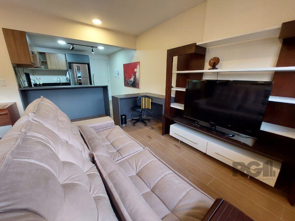 Apartamento stidio com 1 dormitório, 1 vaga de garagem no Bairro Auxiliadora.