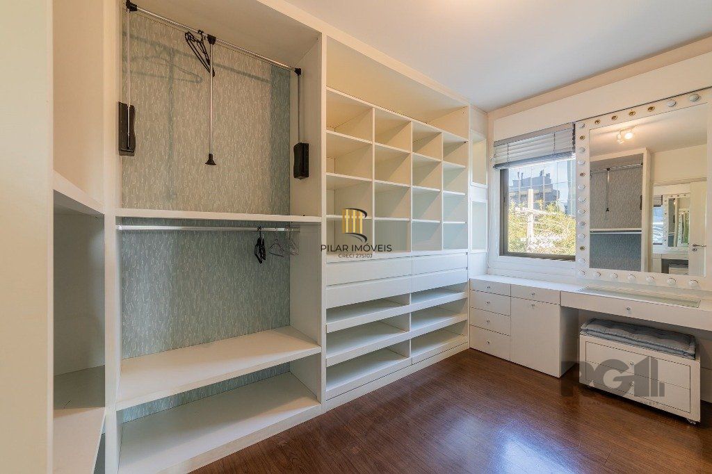 Vende-se excelente apartamento 2 quartos c/ 2 suítes, 2 vagas, living com lareira, sacada e churrasqueira - 98m² - Auxiliadora