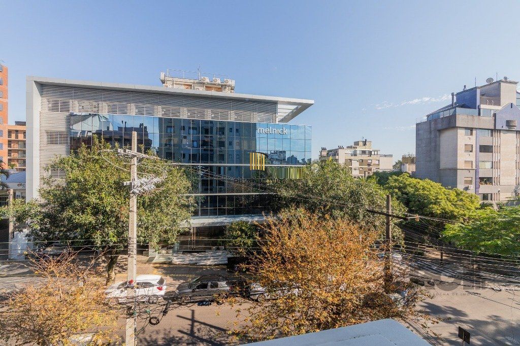 Vende-se excelente apartamento 2 quartos c/ 2 suítes, 2 vagas, living com lareira, sacada e churrasqueira - 98m² - Auxiliadora