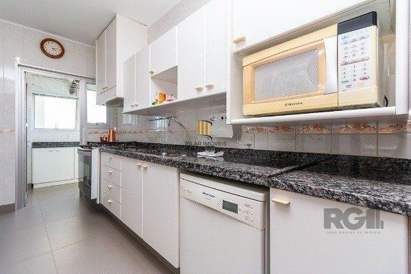 Vende-se amplo apartamento 3 quartos c/ suíte, 2 vagas, living com sacada e vista - 139m² - Auxiliadora
