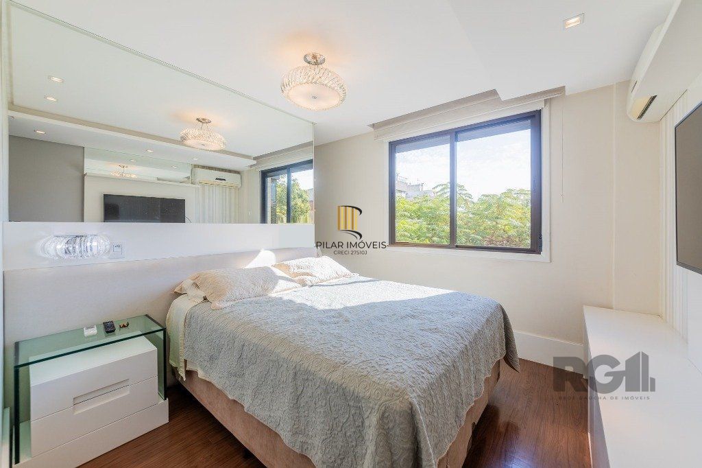 Vende-se excelente apartamento 2 quartos c/ 2 suítes, 2 vagas, living com lareira, sacada e churrasqueira - 98m² - Auxiliadora