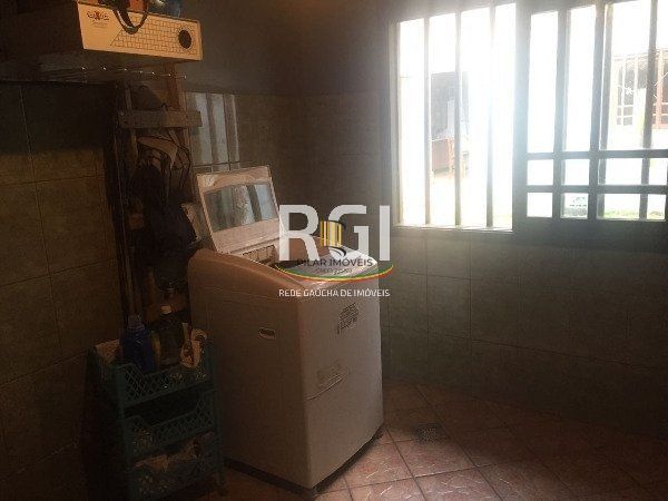 Casa à Venda – 320m², 3 Dormitórios (1 Suíte), 5 Vagas – Partenon
