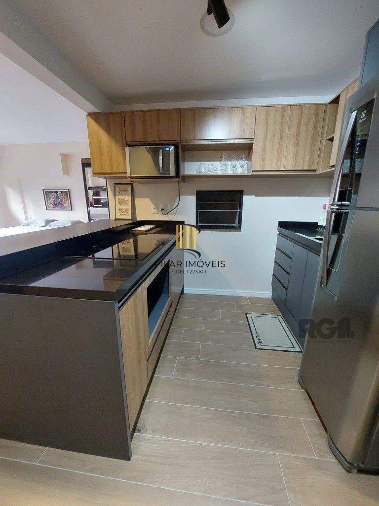 Apartamento stidio com 1 dormitório, 1 vaga de garagem no Bairro Auxiliadora.