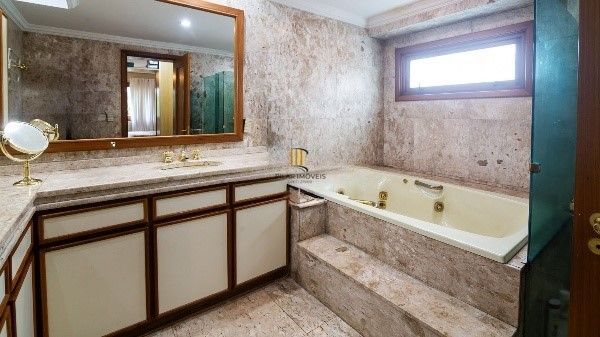 Apartamento com 4 suítes, churrasqueira e 3 vagas - 287m² - Bela Vista